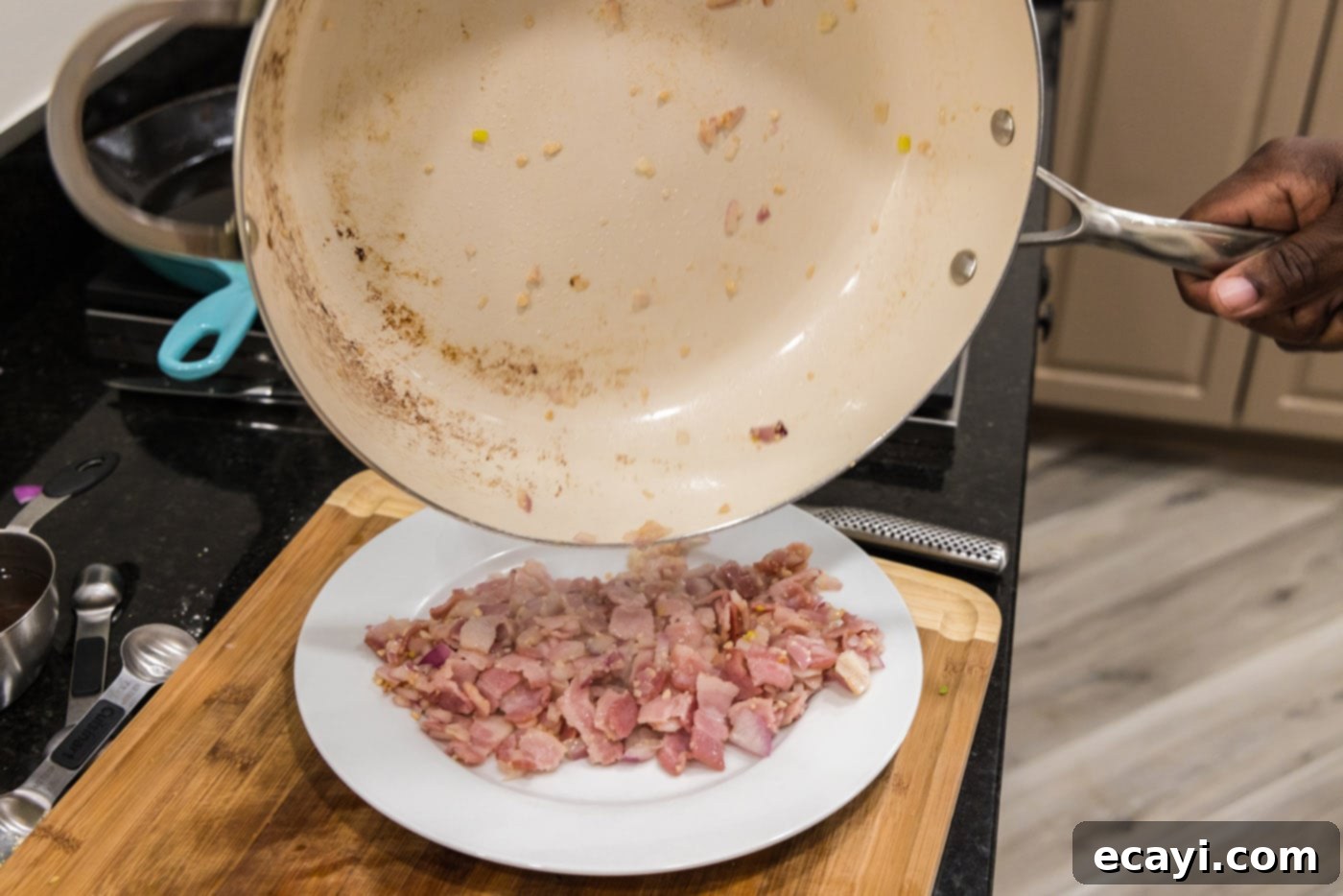 Homestyle Southern Green Beans 7 Transferring the cooked shallot, bacon, and garlic mixture to a plate