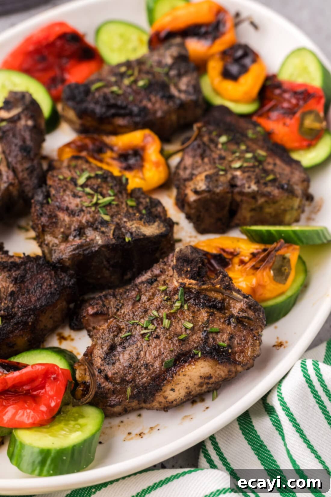 Succulent Grilled Lamb Loin 3 Close up photo of perfectly grilled lamb loin chops with a crispy exterior