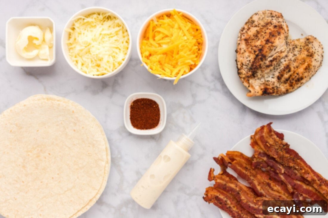 Ultimate Chicken Bacon Ranch Quesadillas 4 A flat lay photograph displaying all the fresh ingredients required to make delicious Chicken Bacon Ranch Quesadillas.