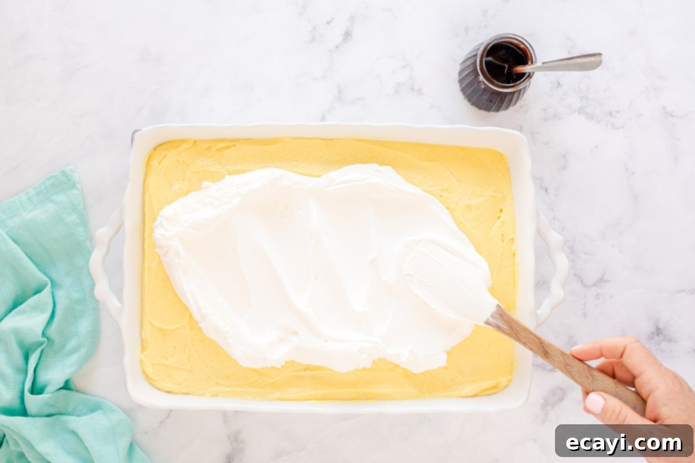 Ultimate Chocolate Eclair Puff Cake 9 topping pudding layer with whipped topping