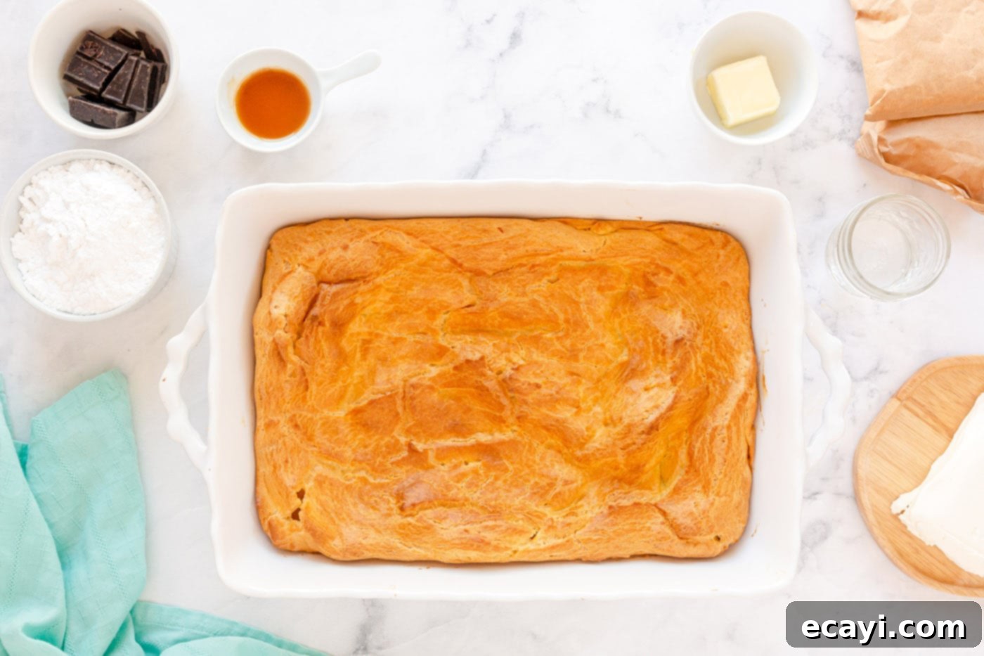 Ultimate Chocolate Eclair Puff Cake 6 puff pastry crust in a baking pan