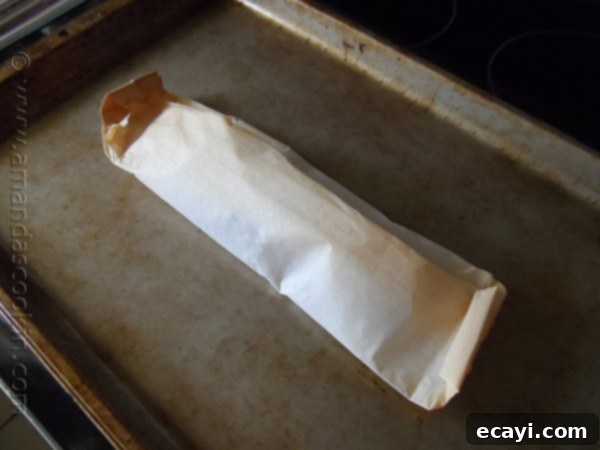 Parchment-Steamed Oriental Fish 12 Chinese Style Parchment Fish at AmandasCookin.com @amandaformaro