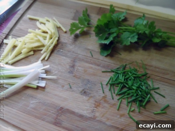 Parchment-Steamed Oriental Fish 5 Chinese Style Parchment Fish at AmandasCookin.com @amandaformaro