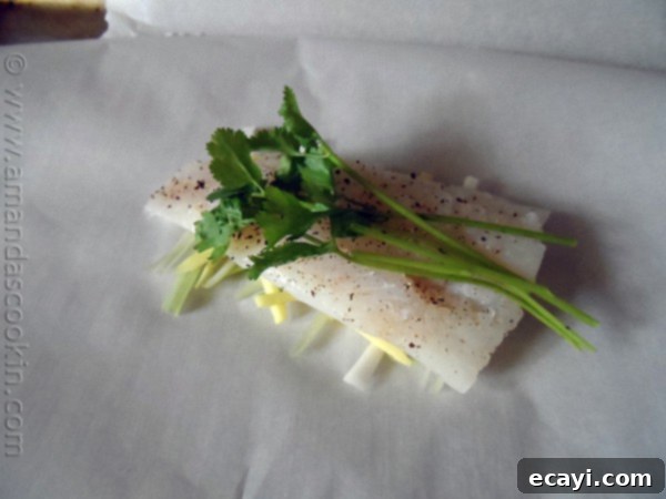Parchment-Steamed Oriental Fish 9 Chinese Style Parchment Fish at AmandasCookin.com @amandaformaro