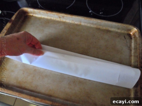 Parchment-Steamed Oriental Fish 10 Chinese Style Parchment Fish at AmandasCookin.com @amandaformaro