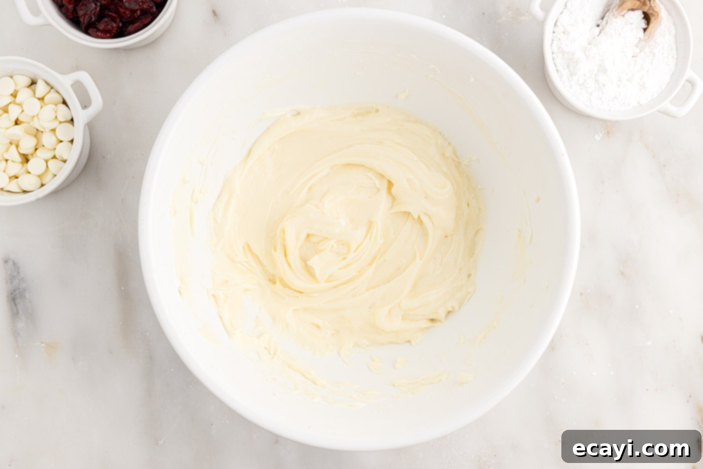 Dreamy Cranberry Squares 13 Smooth white chocolate cream cheese frosting in a bowl