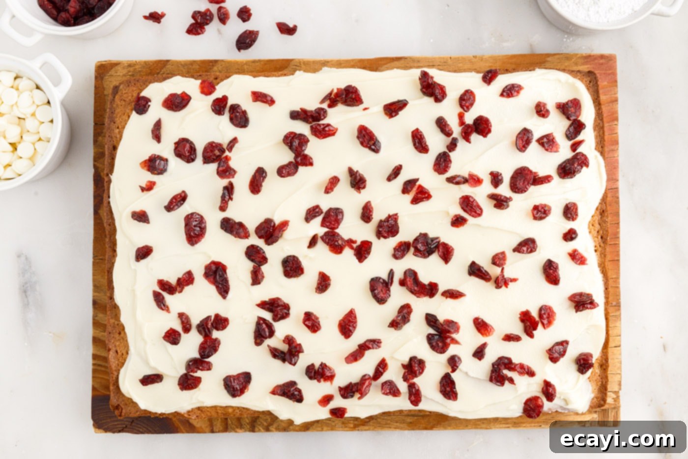 Dreamy Cranberry Squares 16 Dried cranberries sprinkled over frosted white chocolate blondies