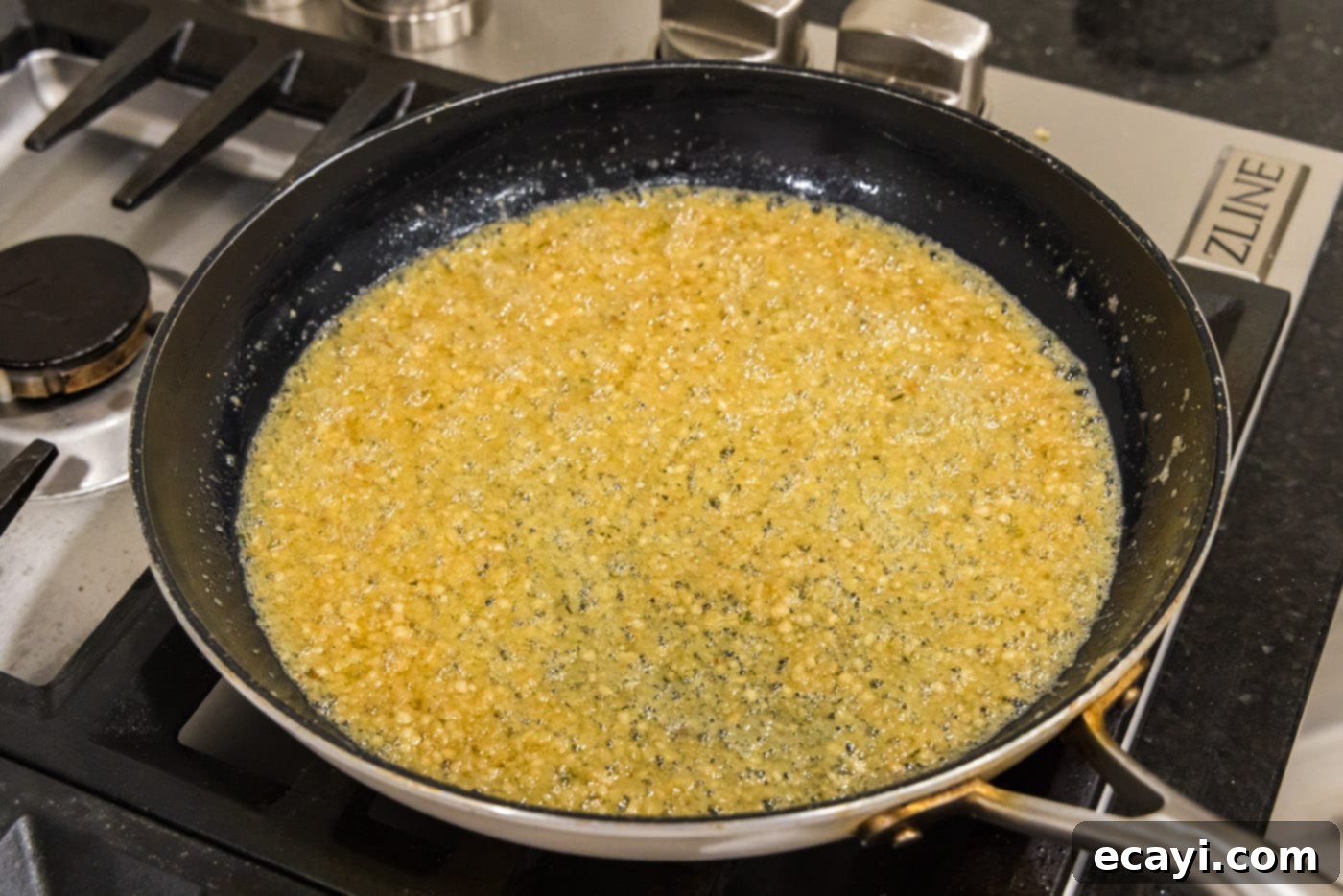Crispy Garlic Parmesan Wings 13 Creamy garlic parmesan butter sauce in a skillet