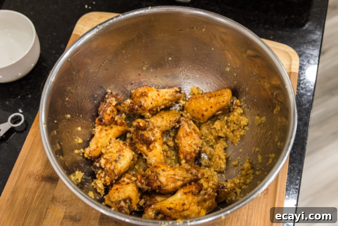 Crispy Garlic Parmesan Wings 16 Easy garlic parmesan wings fully coated in sauce, ready to serve