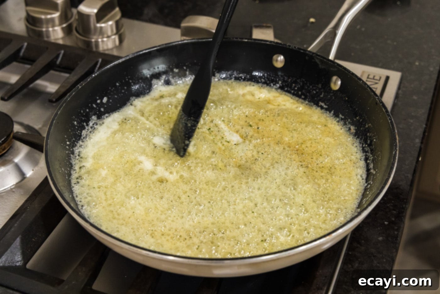 Crispy Garlic Parmesan Wings 10 Bubbly butter with onion powder and garlic salt in a skillet