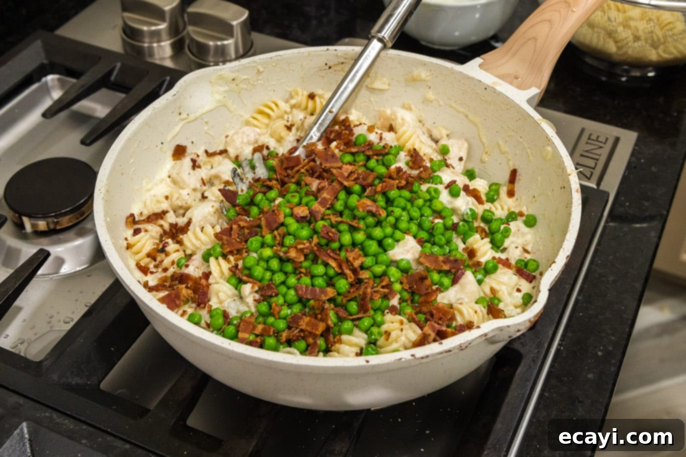 Surf and Turf Carbonara 15 adding peas and bacon to chicken and shrimp carbonara
