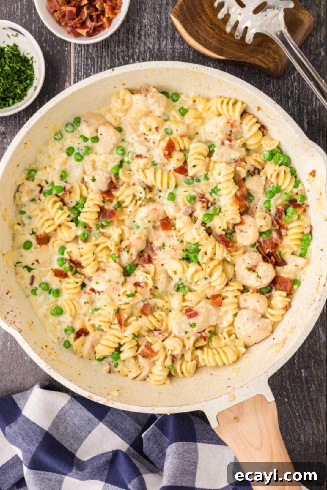 Surf and Turf Carbonara 3 A skillet filled with freshly prepared Chicken and Shrimp Carbonara, ready to be served.
