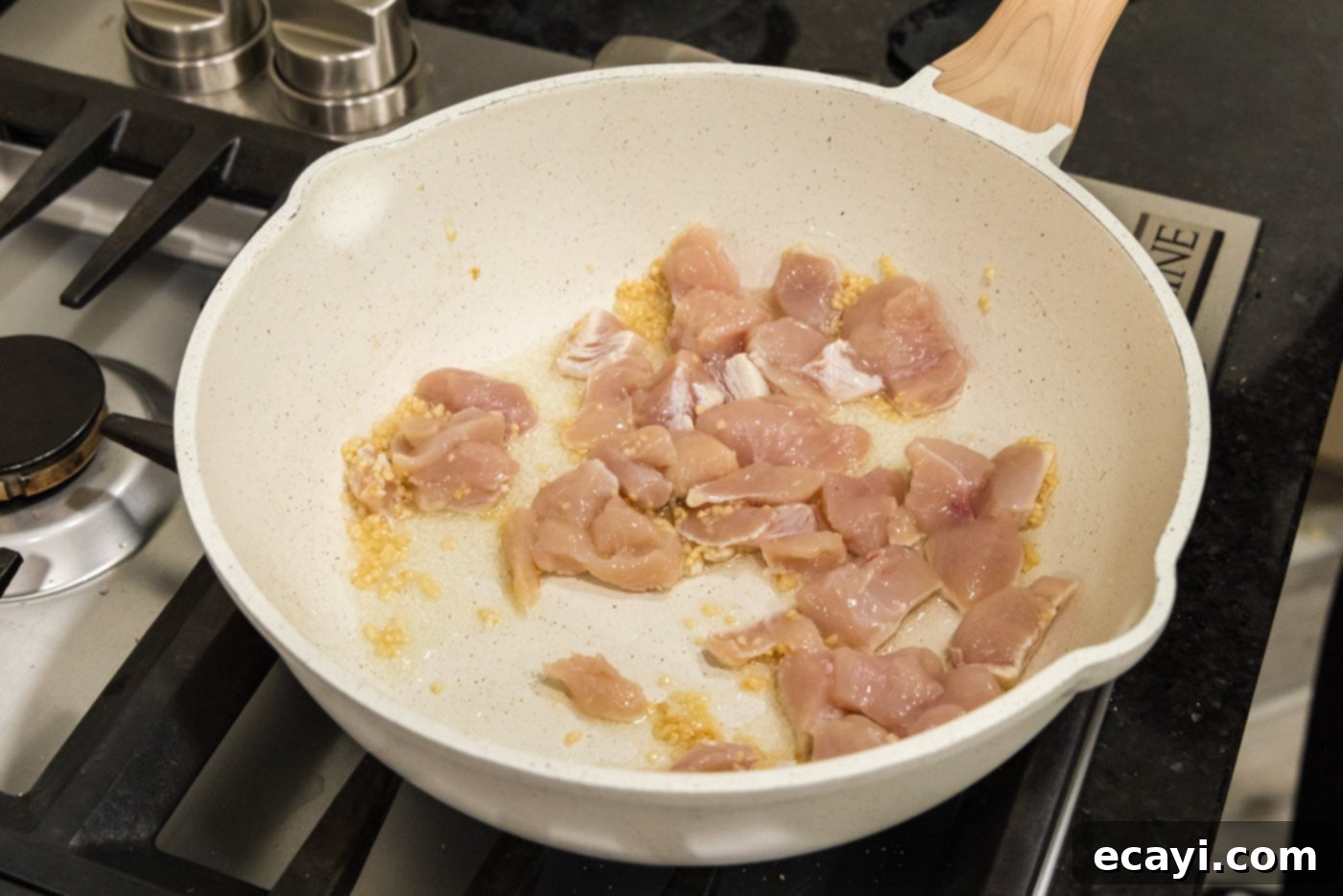 Surf and Turf Carbonara 5 chicken in skillet with oil