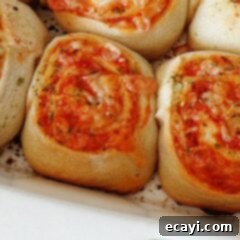 Pizza Pinwheels 12 A close up photo of pizza roll ups.