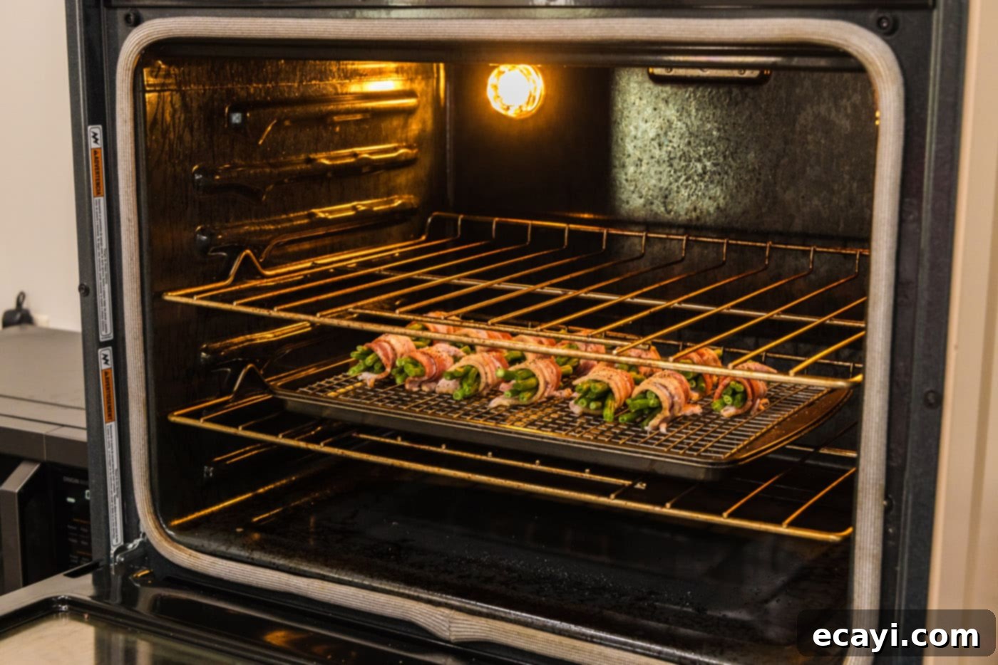 Bacon Green Bean Bundles 9 Bacon wrapped green bean bundles baking in the oven for a crispy finish
