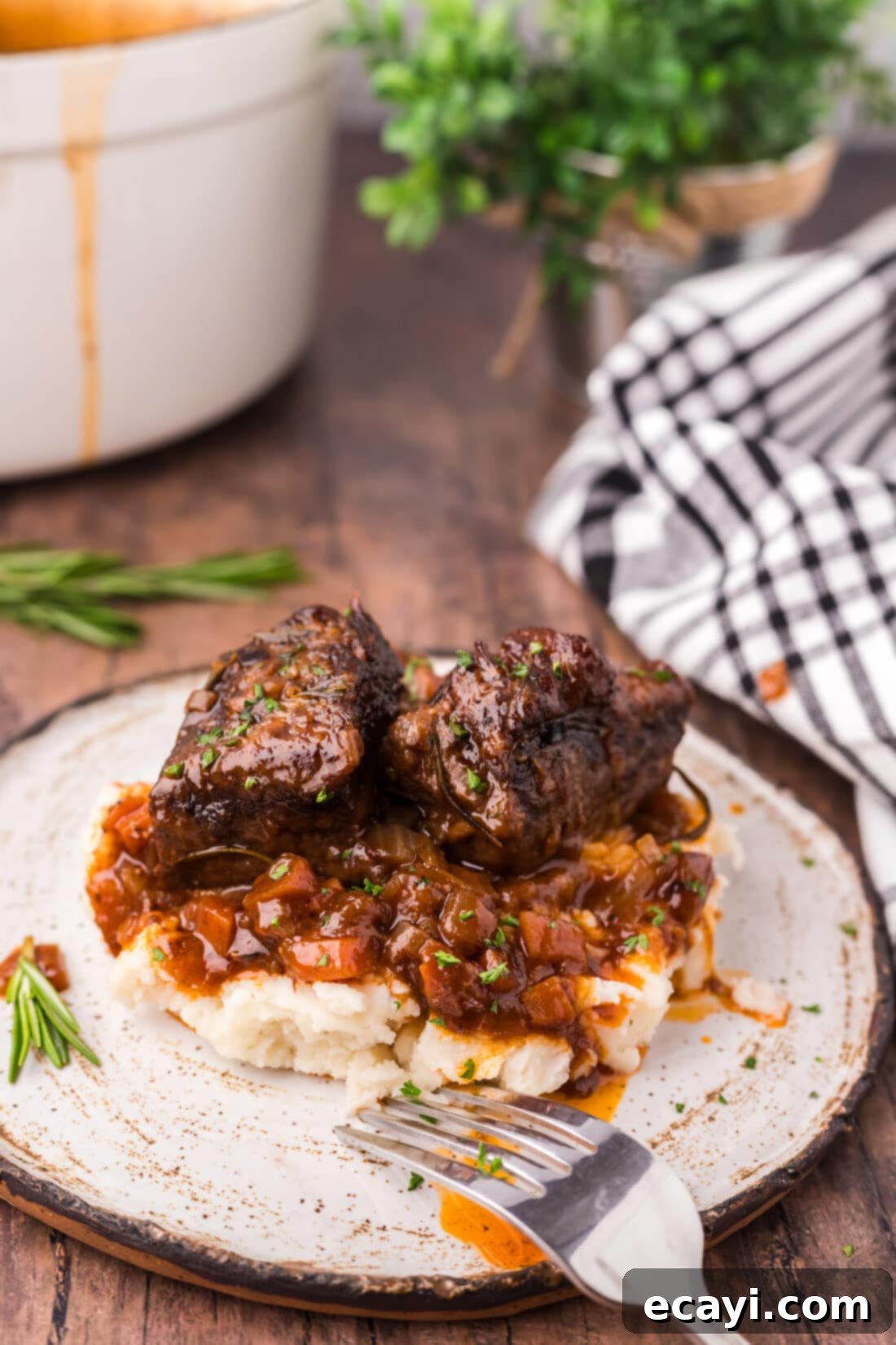 Fork-Tender Beef Short Ribs 2 Braised Beef Short Ribs served over mashed potatoes