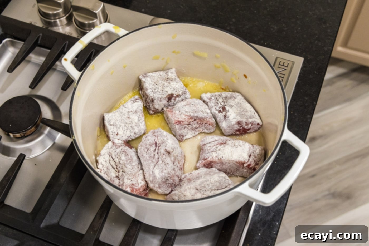 Fork-Tender Beef Short Ribs 9 flour dredged beef short ribs searing in a dutch oven
