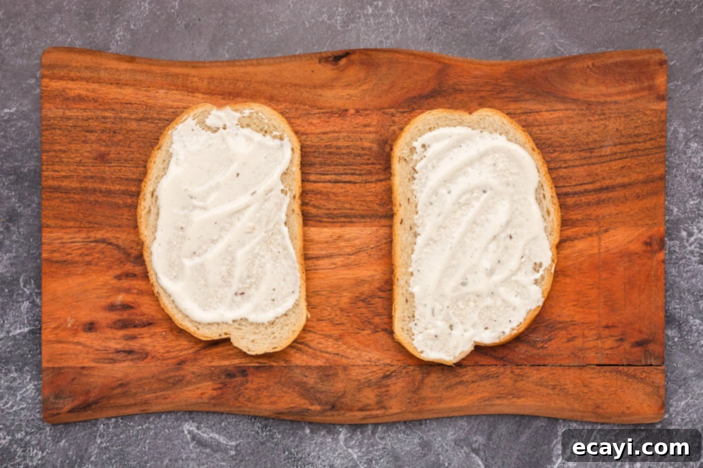 Ultimate Chicken Bacon Ranch Stack 5 ranch dressing spread evenly on rye bread slices