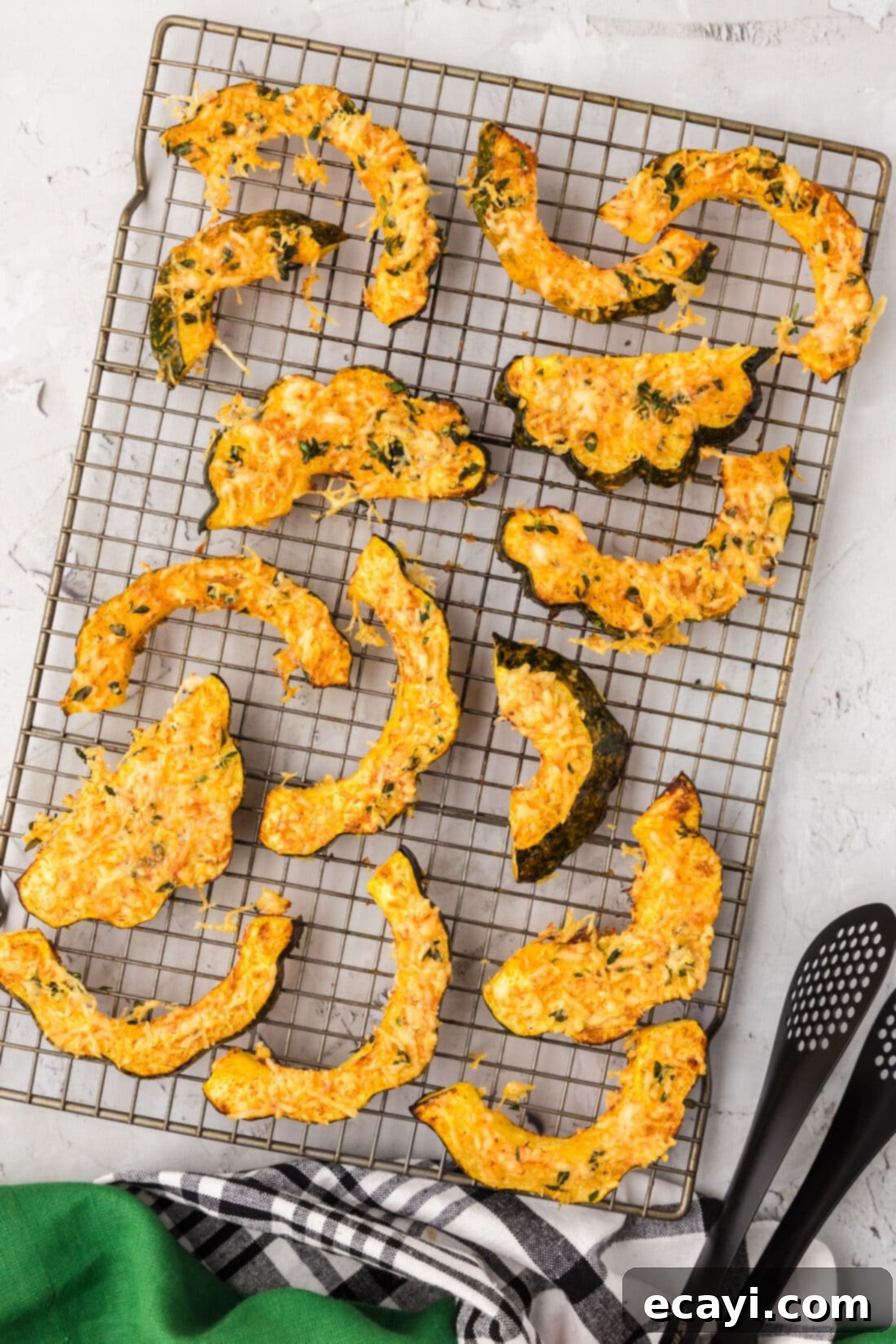 Delicious Air Fryer Acorn Squash 3 Air Fryer Acorn Squash slices cooling on a wire rack after cooking