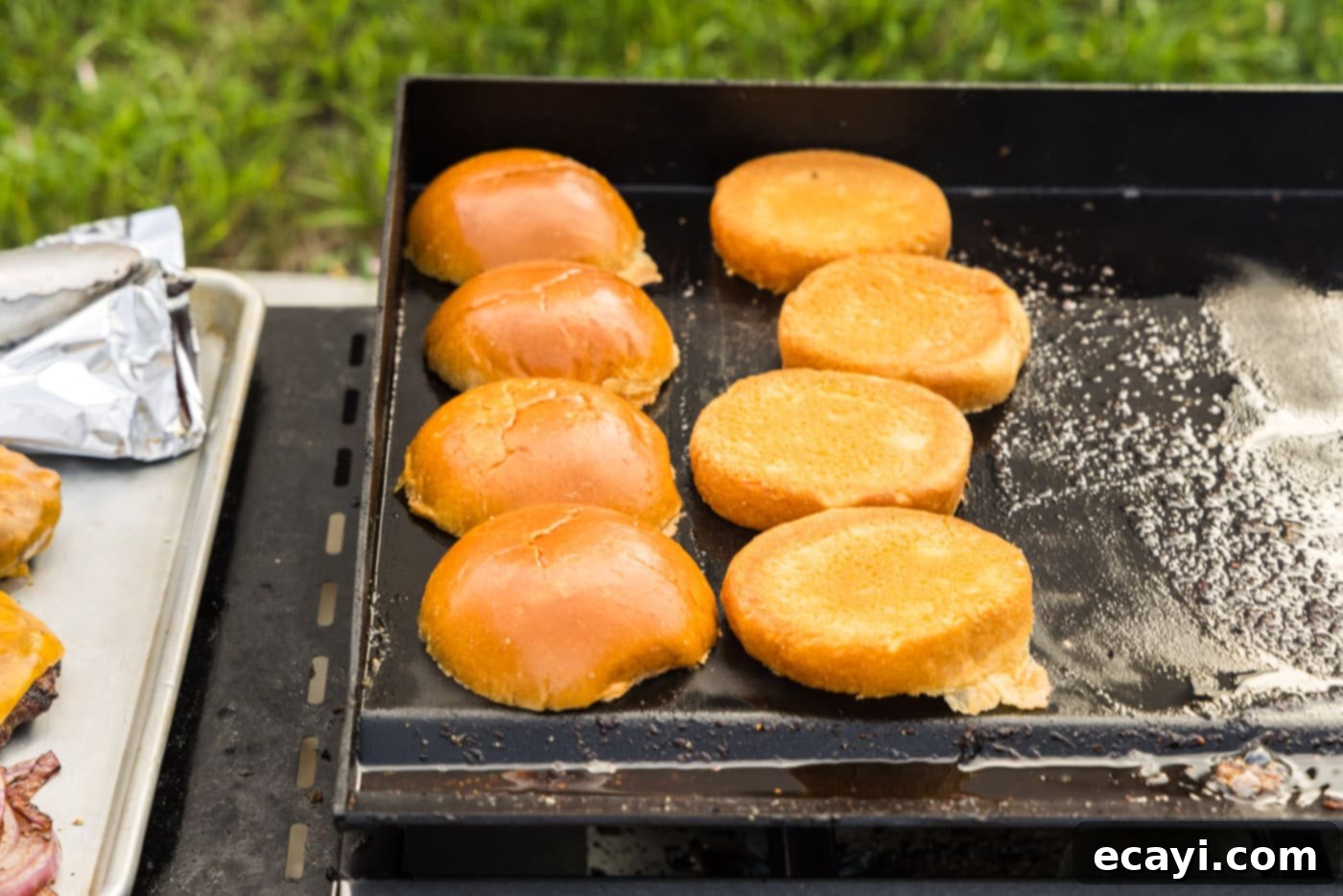 Smoky BBQ Bacon Burgers 12 toasting burger buns on a grill