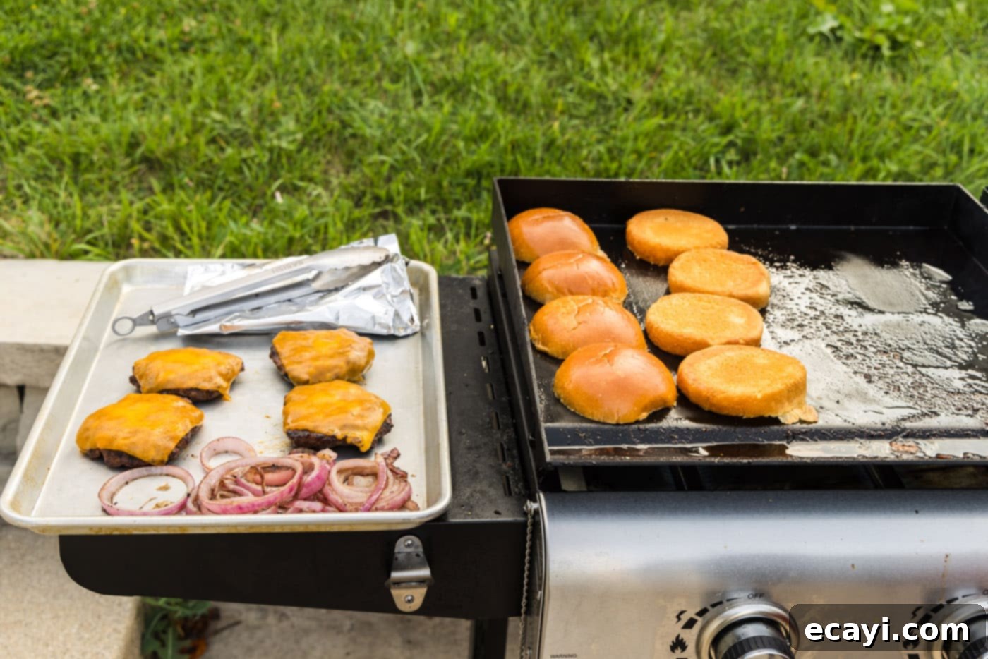 Smoky BBQ Bacon Burgers 13 buns, burger patties, and grilled onions on the grill