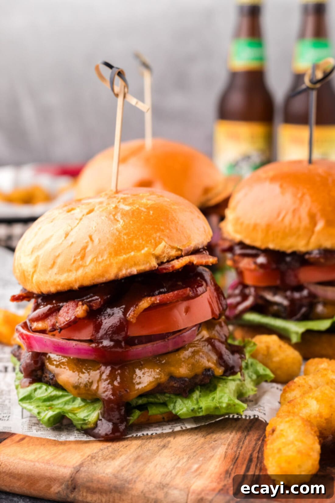 Smoky BBQ Bacon Burgers 14 BBQ Bacon Burgers on a wooden board