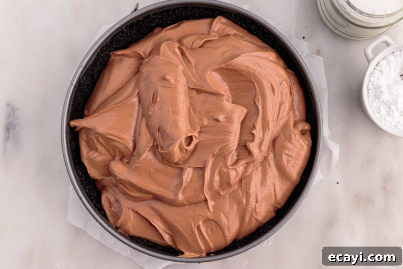 Decadent No-Bake Chocolate Cheesecake 16 chocolate cheesecake mixture in a springform pan