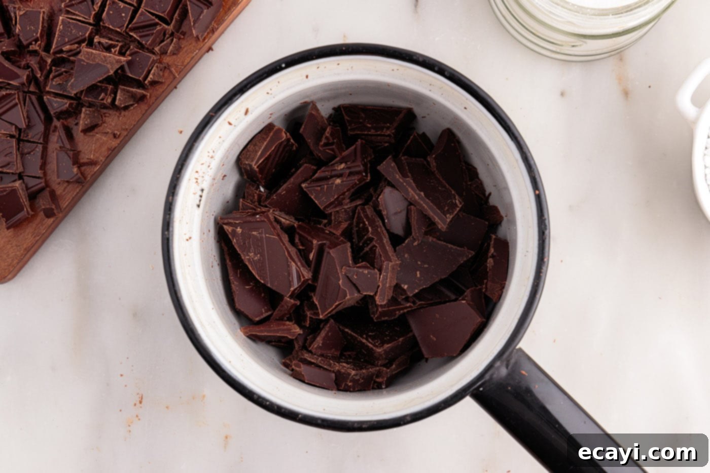 Decadent No-Bake Chocolate Cheesecake 5 chopped chocolate in a double boiler