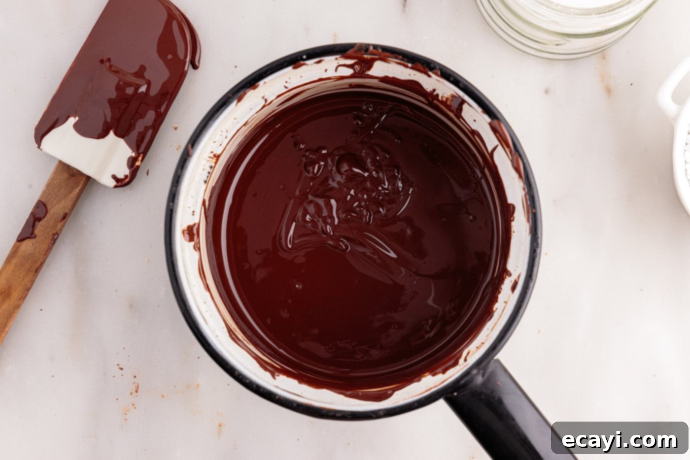 Decadent No-Bake Chocolate Cheesecake 6 melting chocolate in a double boiler
