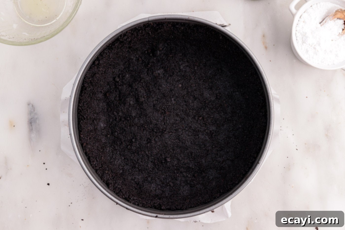 Decadent No-Bake Chocolate Cheesecake 9 chocolate graham cracker crust for cheesecake in a springform pan