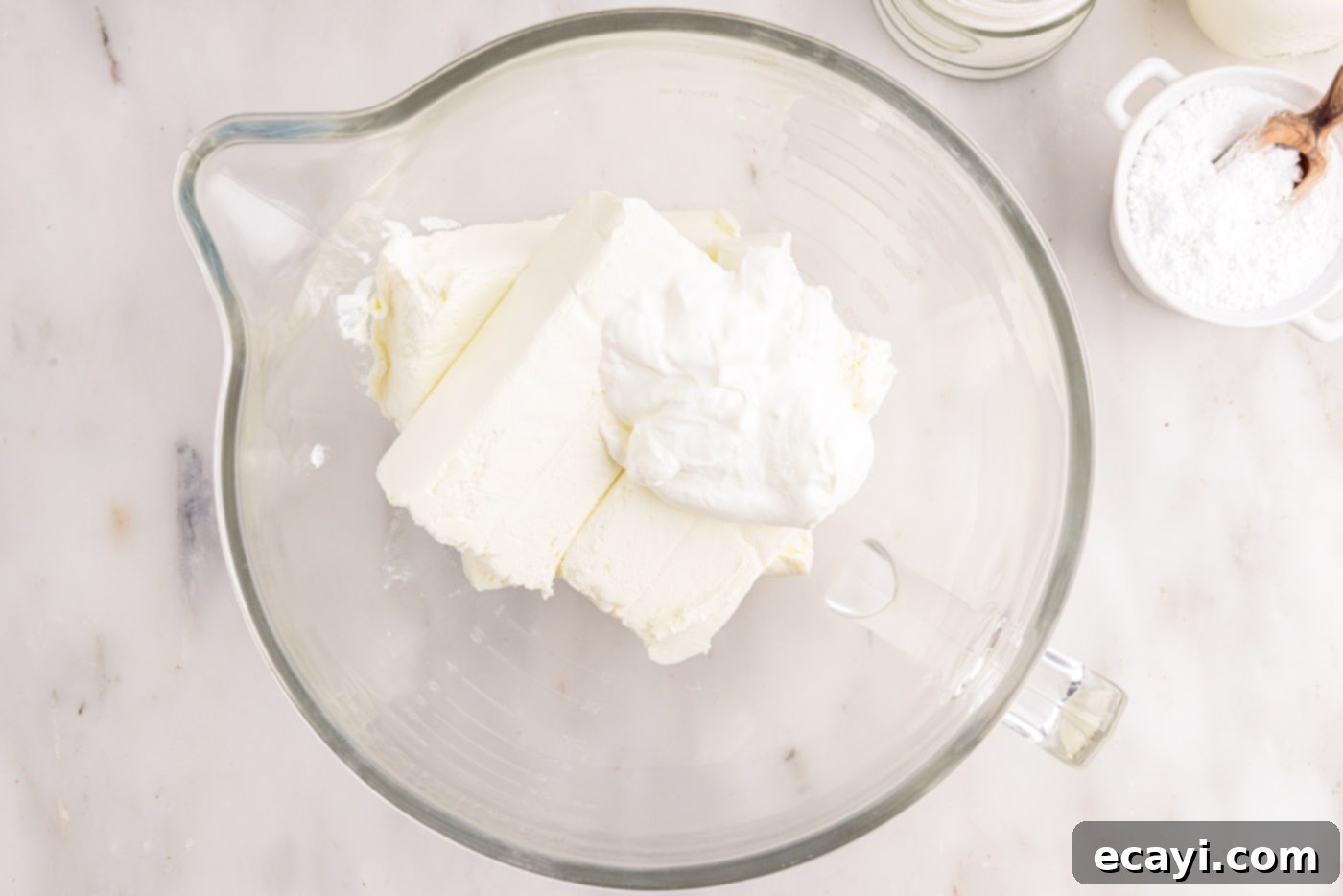 Decadent No-Bake Chocolate Cheesecake 10 cream cheese and sour cream in a mixing bowl