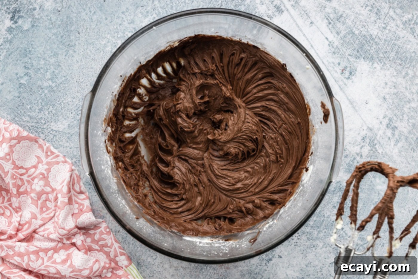 Decadent Espresso Fudge Brownies 9 Bowl of freshly made, smooth and glossy fudge frosting, ready to be spread