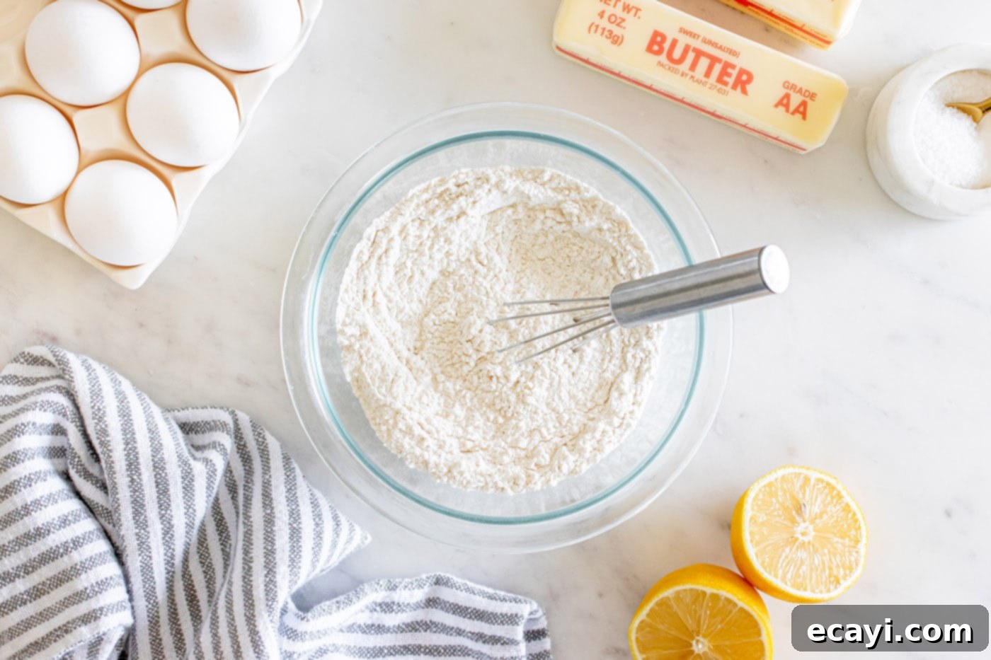 Zesty Lemon Loaf 5 dry ingredients for lemon pound cake whisked together in a bowl