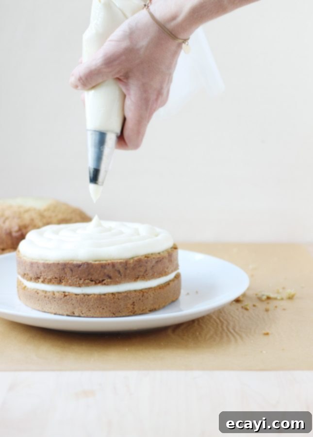 Bright Lemon Zucchini Cake with Tangy Goat Cheese Frosting and Zesty Glaze 7 Lemon Zucchini Cake with Goat Cheese Frosting and Lemon Glaze, a recipe adapted from the book Layered by Tessa Huff // FoodNouveau.com