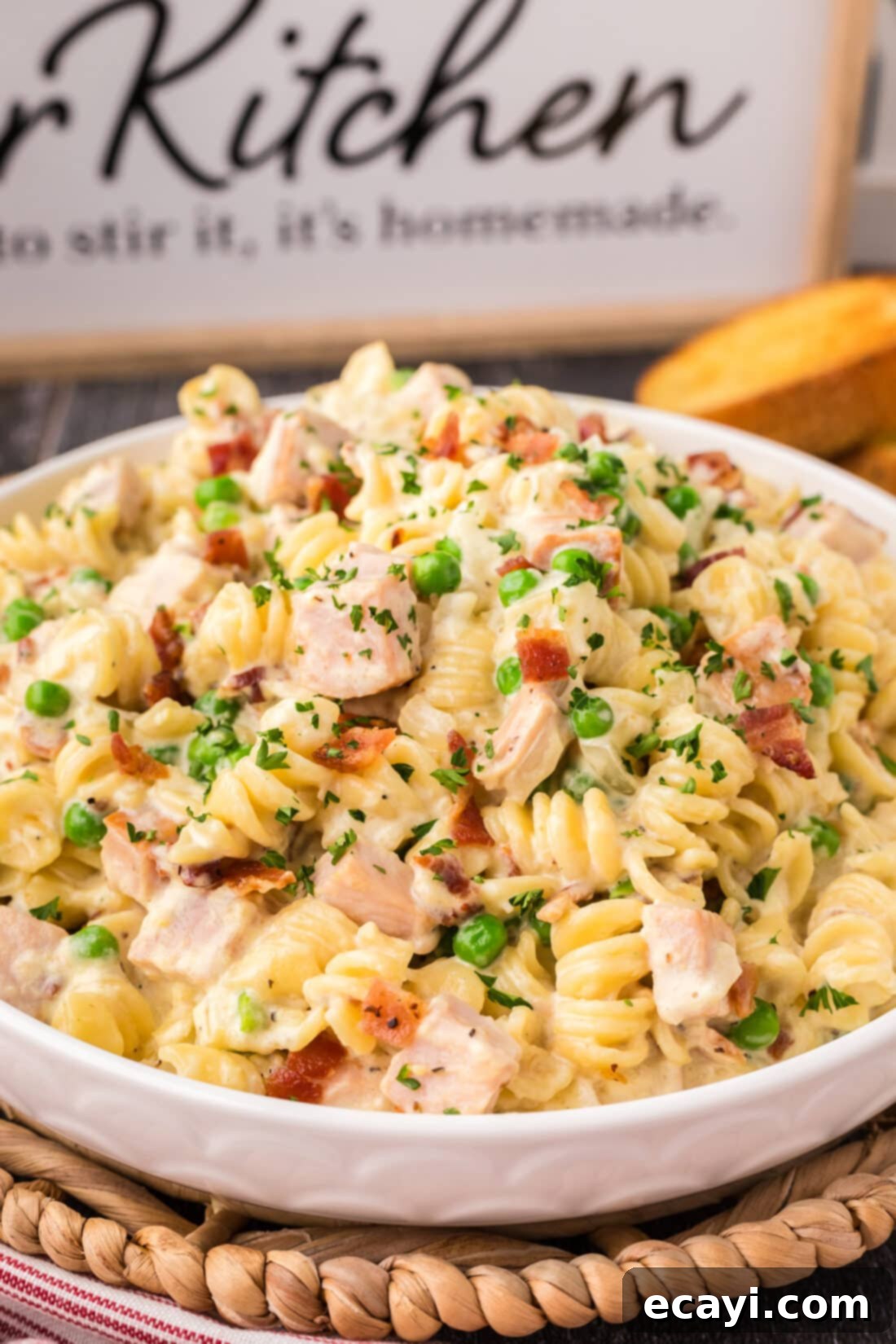 Smoked Turkey Carbonara 2 Side shot of a bowl of Turkey Carbonara with a creamy sauce