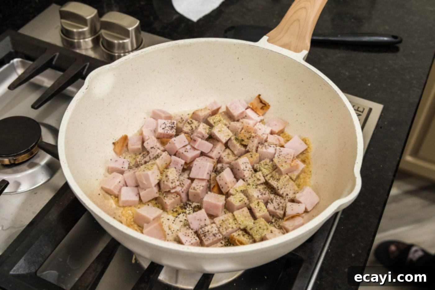Smoked Turkey Carbonara 6 Cubed turkey and seasonings added to the garlic and oil mixture in the skillet