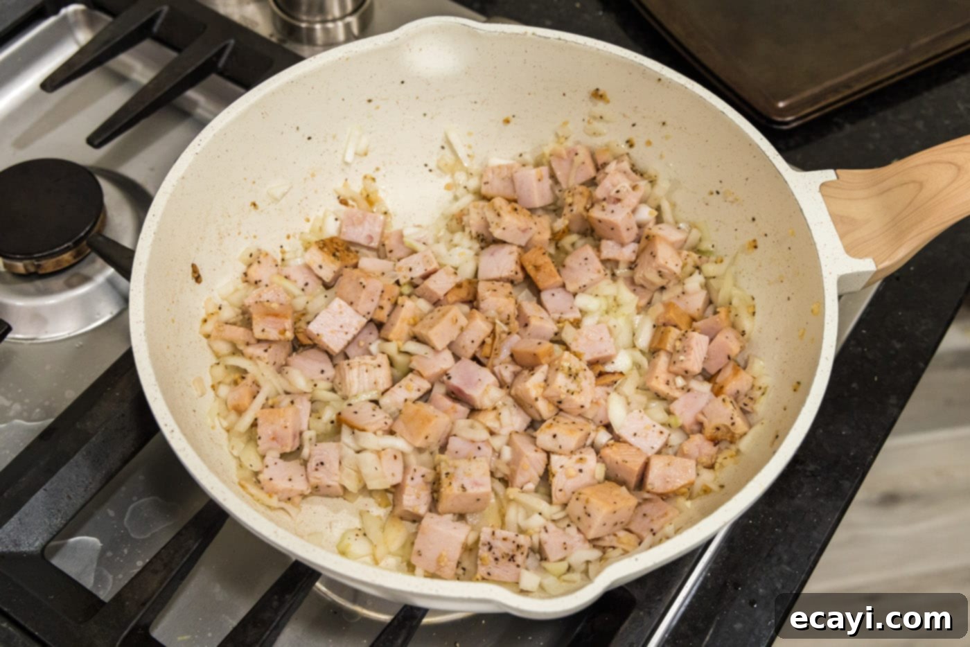 Smoked Turkey Carbonara 7 Cooked cubed turkey with softened onion and garlic in the skillet