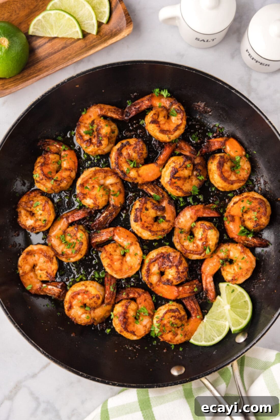 Fiery Prawns 2 Close up photo of a skillet of perfectly cooked, vibrant red Spicy Shrimp