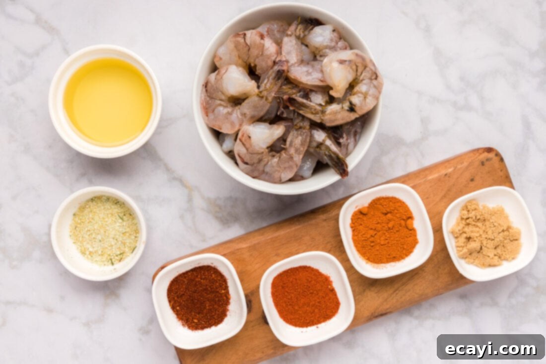 Fiery Prawns 4 A flat lay photograph showing all the ingredients for Spicy Shrimp laid out neatly.