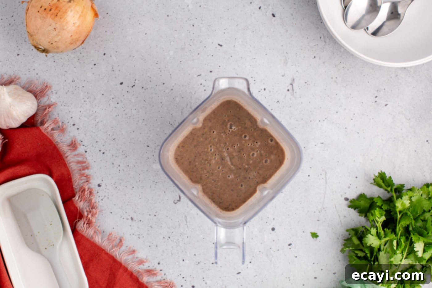 Savory Black Bean Delight 11 Smooth, blended black bean soup in a blender, showing the creamy and thick consistency achieved after pureeing.