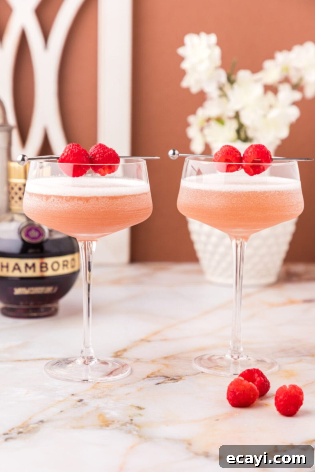 The Parisian Raspberry Sip 11 Two French Martinis topped with two raspberries