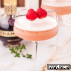 The Parisian Raspberry Sip 12 Close up photo of a French Martini garnished with raspberries