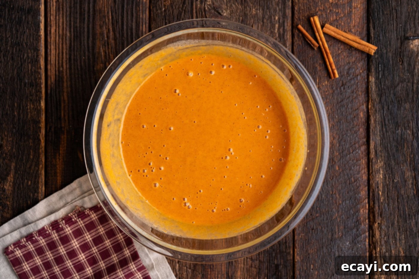 Effortless Pumpkin Spice Bake 6 pumpkin dump cake mixture in a bowl