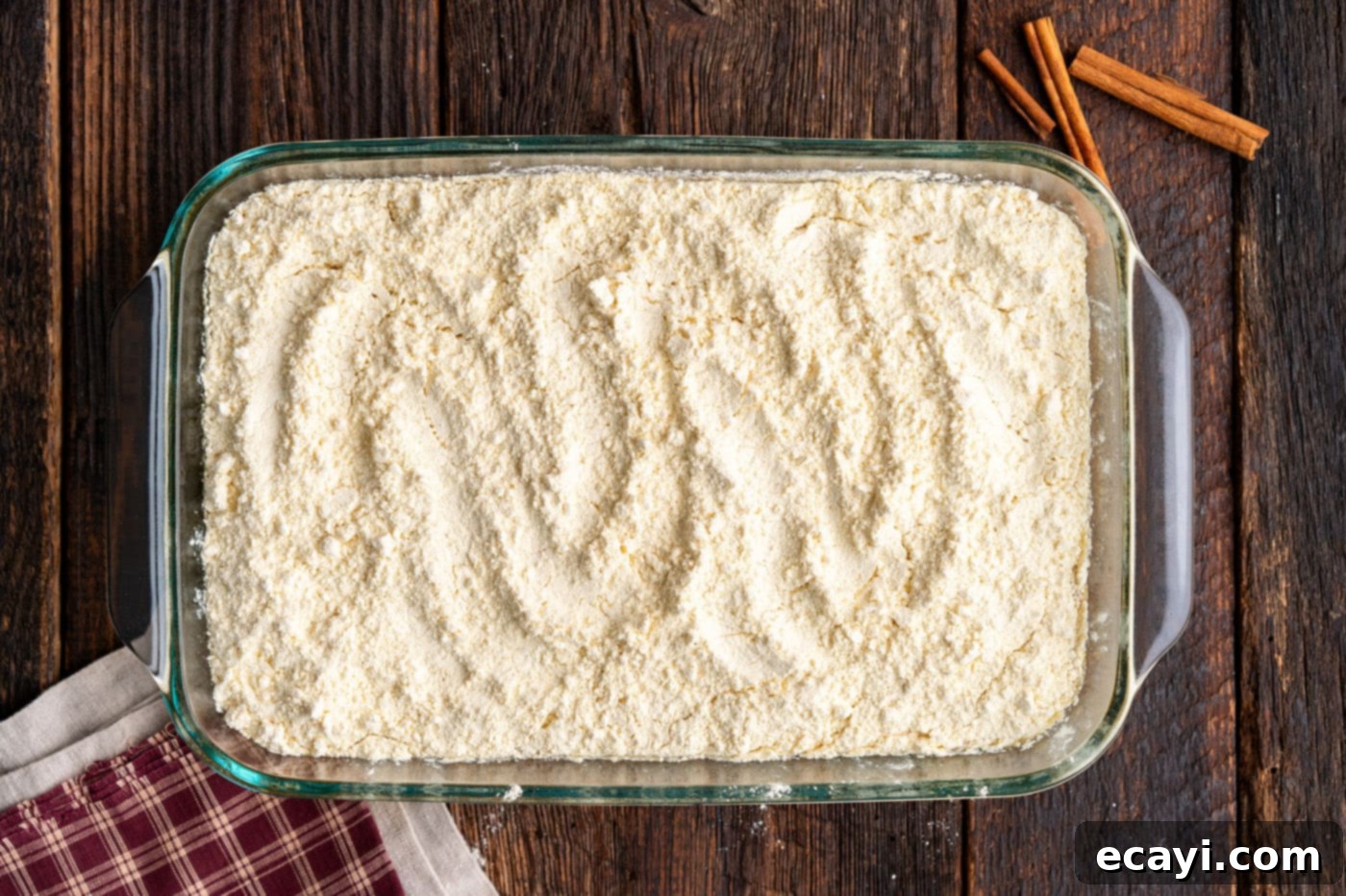 Effortless Pumpkin Spice Bake 8 dry cake mix spread evenly over pumpkin batter