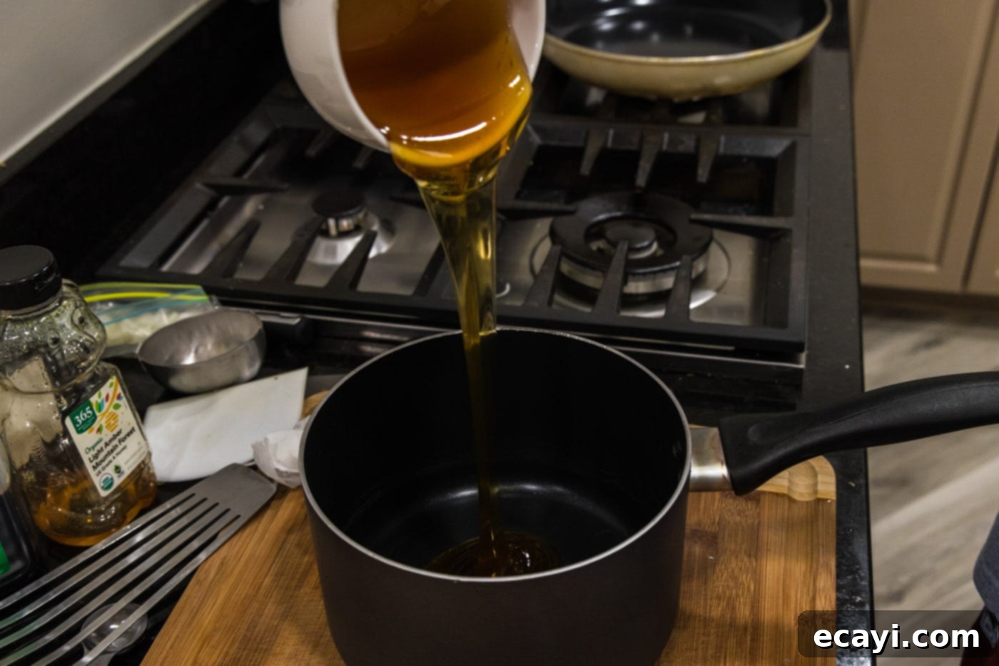 Caramelized Honey Salmon 5 pouring honey into saucepan