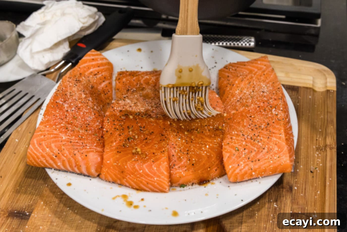 Caramelized Honey Salmon 10 brushing honey garlic glaze over salmon