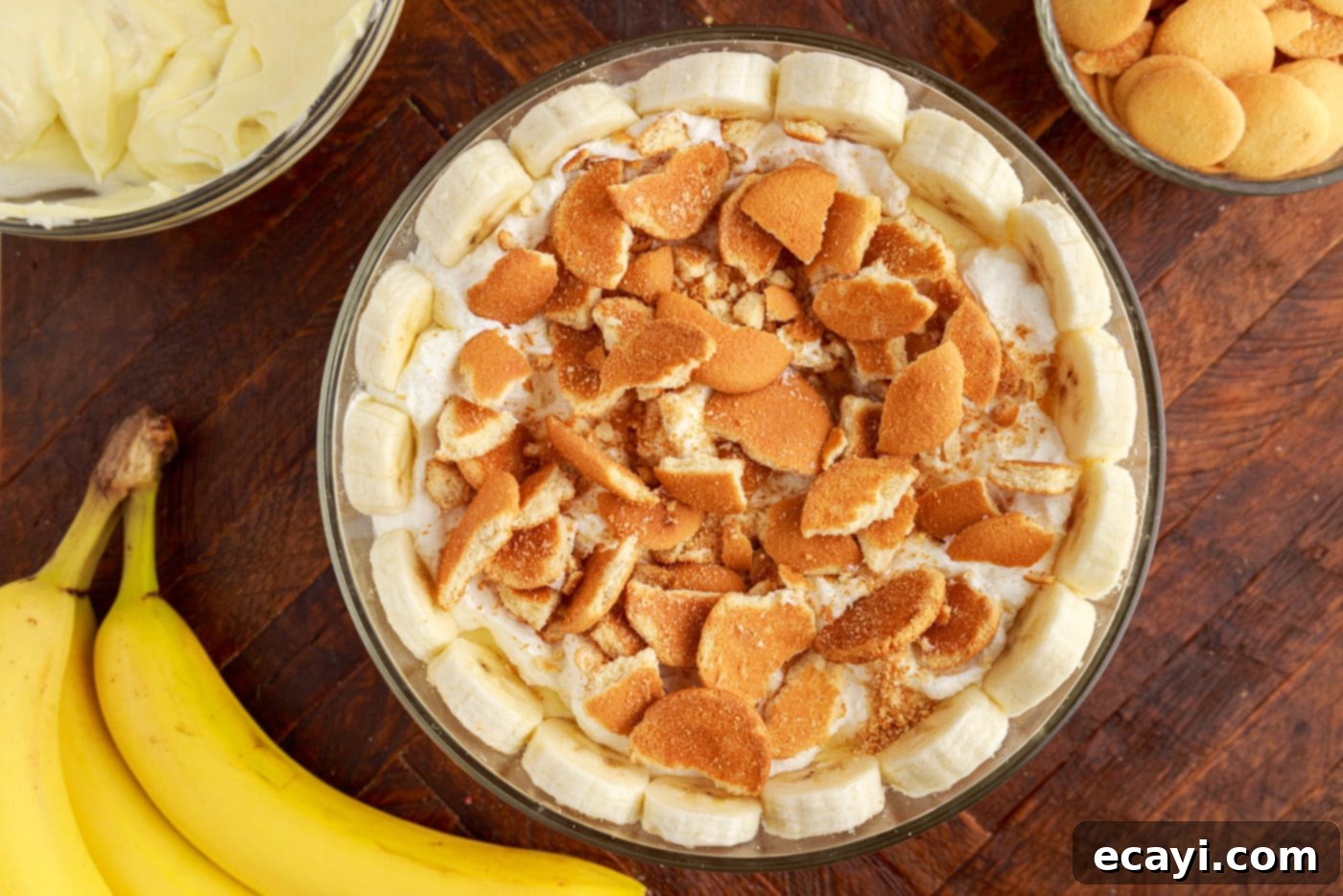 Decadent Banana Layers 14 adding a ring of sliced bananas around the trifle bowl