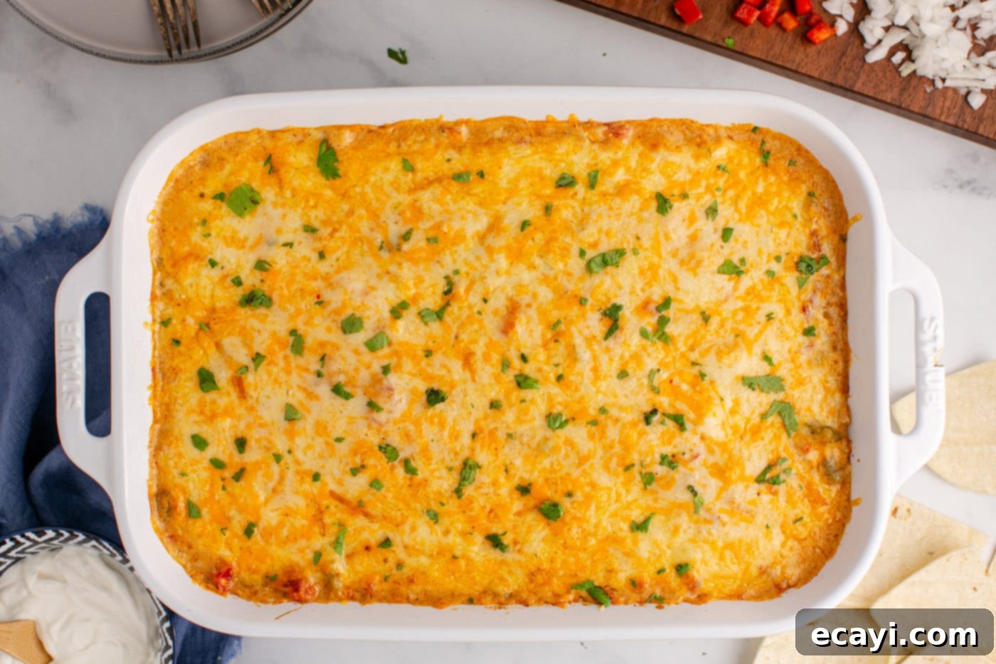 Comforting King Ranch Chicken Casserole 15 The baked King Ranch Chicken Casserole, seen from overhead, bubbly and golden-brown after baking.