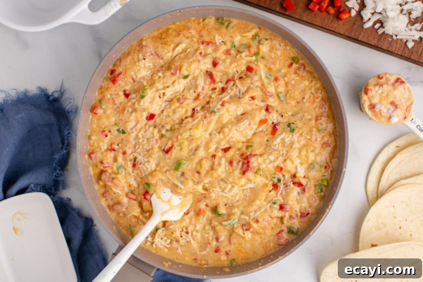 Comforting King Ranch Chicken Casserole 10 All the King Ranch casserole ingredients mixed together in a skillet, forming the flavorful chicken mixture.