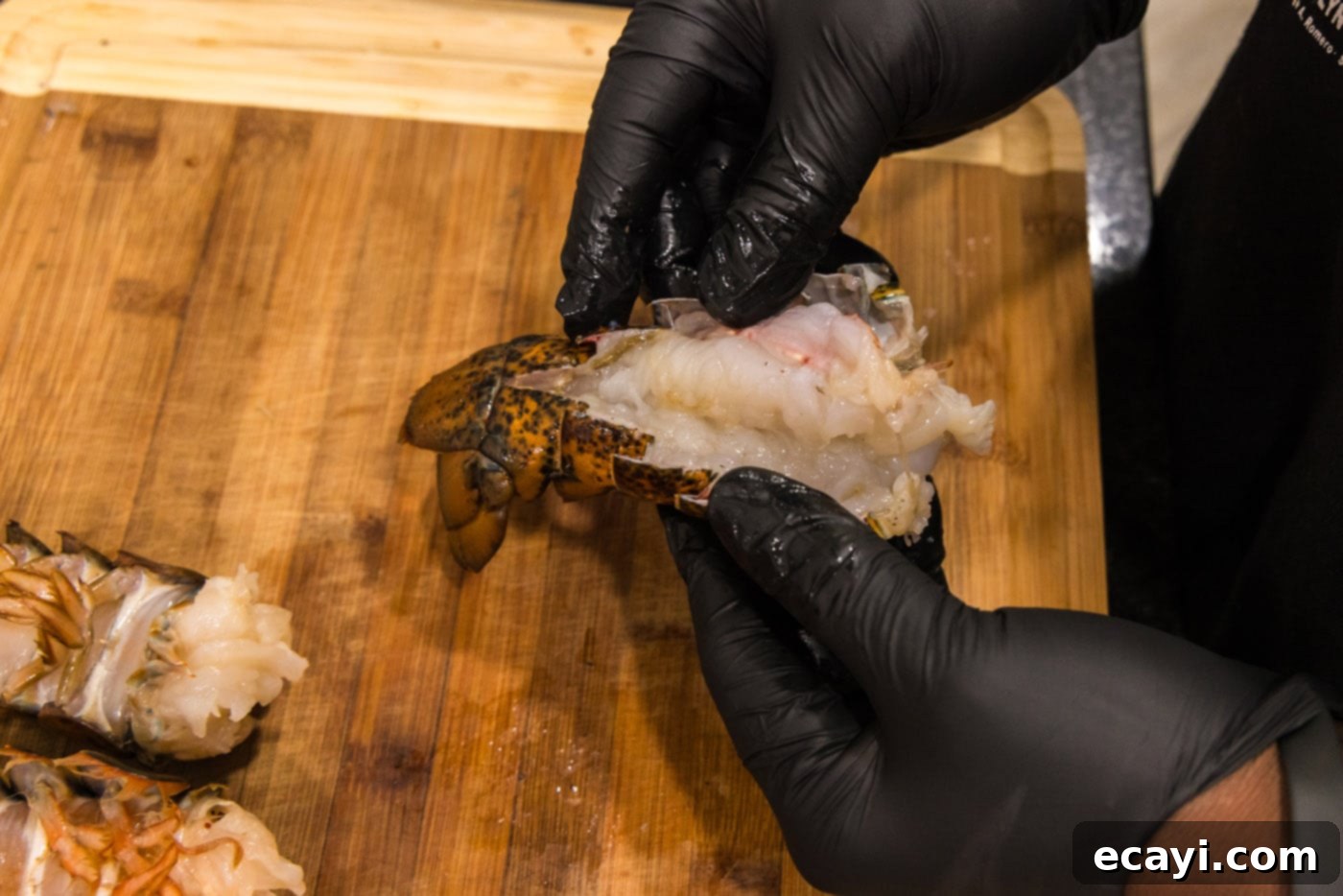 Golden Baked Lobster 7 exposing meat from lobster shell